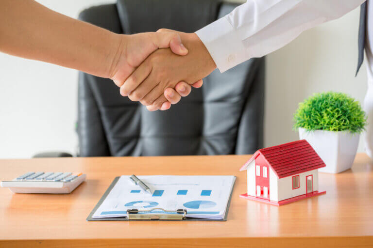 hand shaking while closing a property deal.