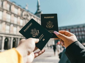 A couple holding Passports.