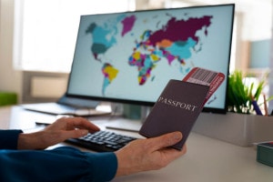 Passport in man hand with map in the background dekstop
