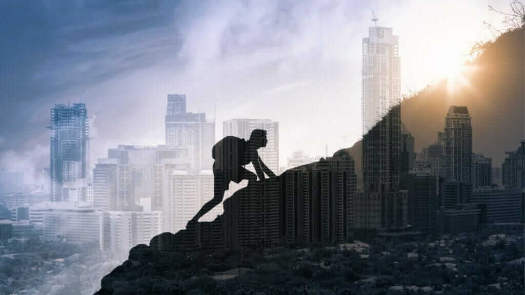Man Climbing a Mountain