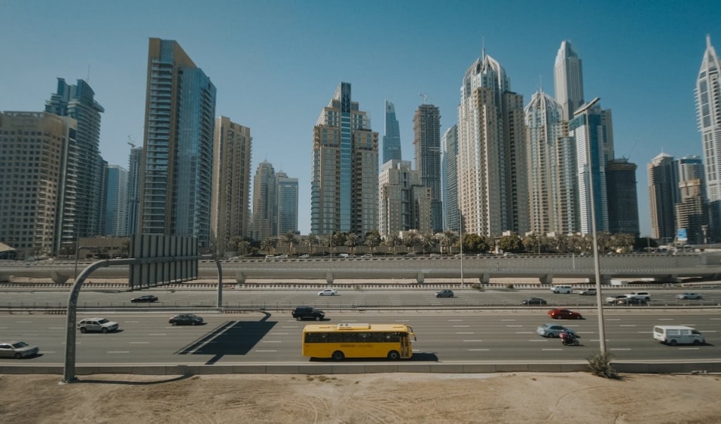 aerial view of Dubai roads with a school bus